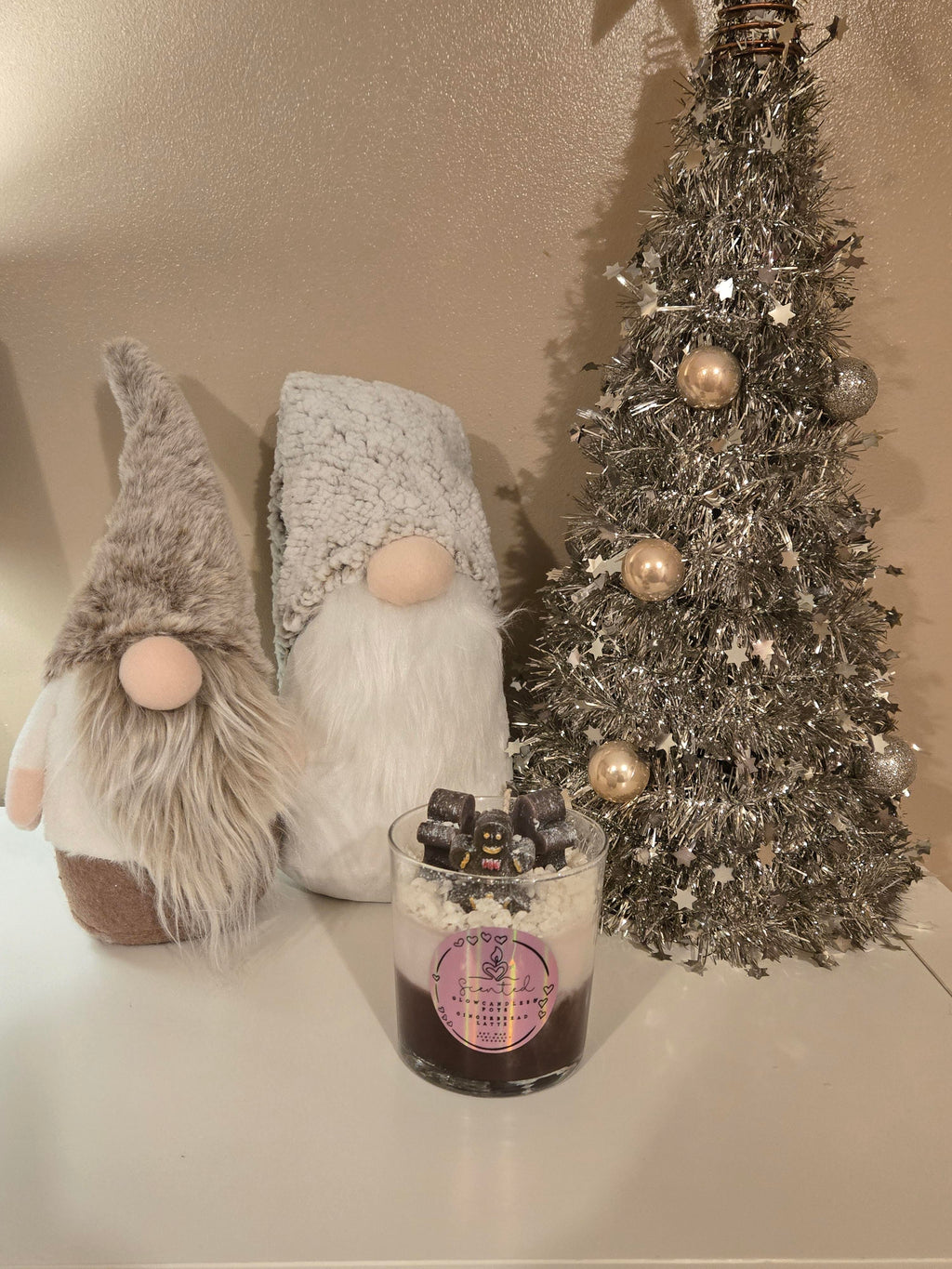 Three Little Gingerbread Men Latte Candle, a cosy festive candle topped with three adorable gingerbread men. Perfect for Christmas vibes.