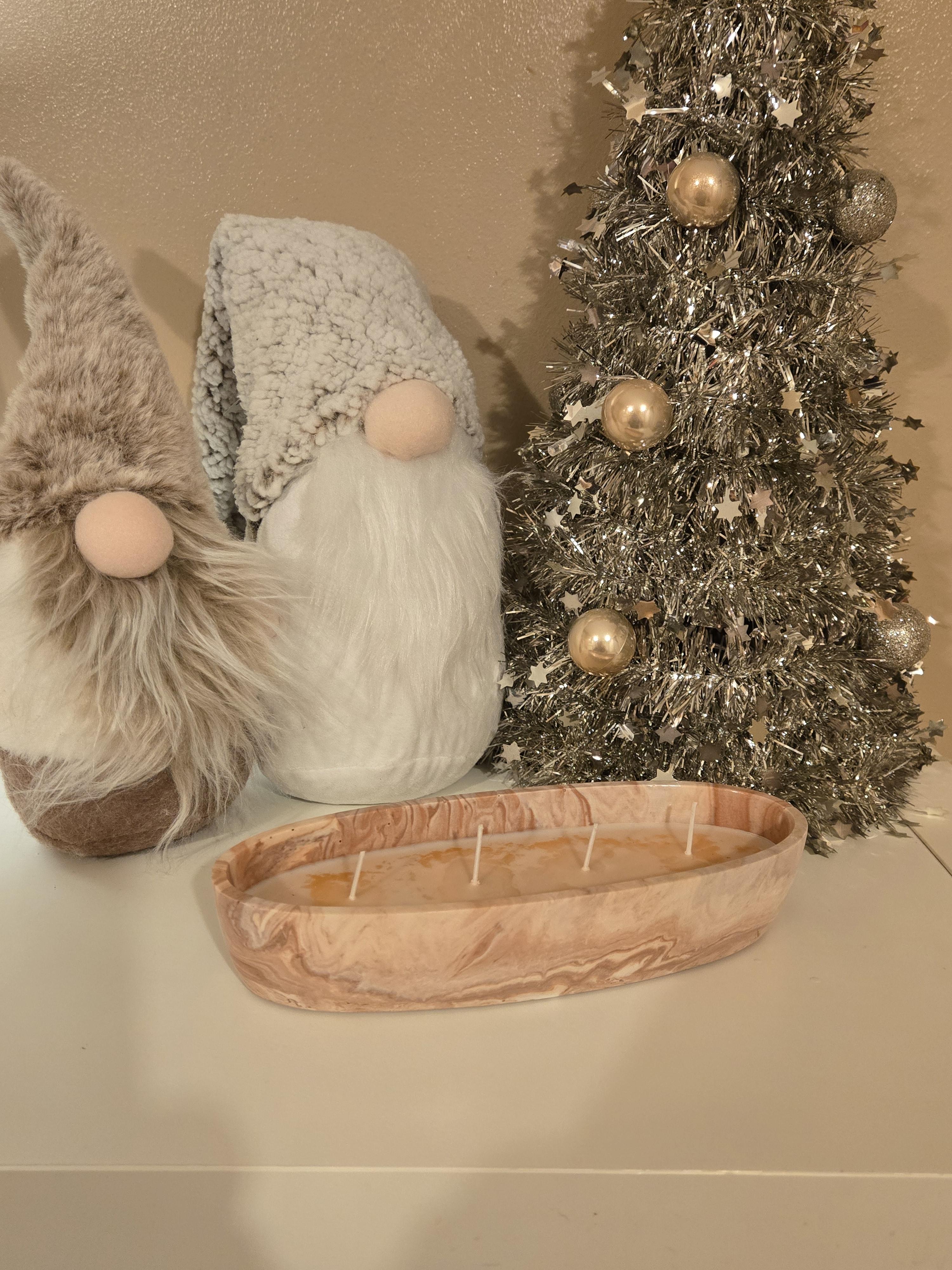 A beautiful Boat shaped handmade pot in a peach & white swirl effect, lovingly filled with our comforting Coffee Cake soy wax, giving off a warm sugary cake notes & a cosy, homely aroma.