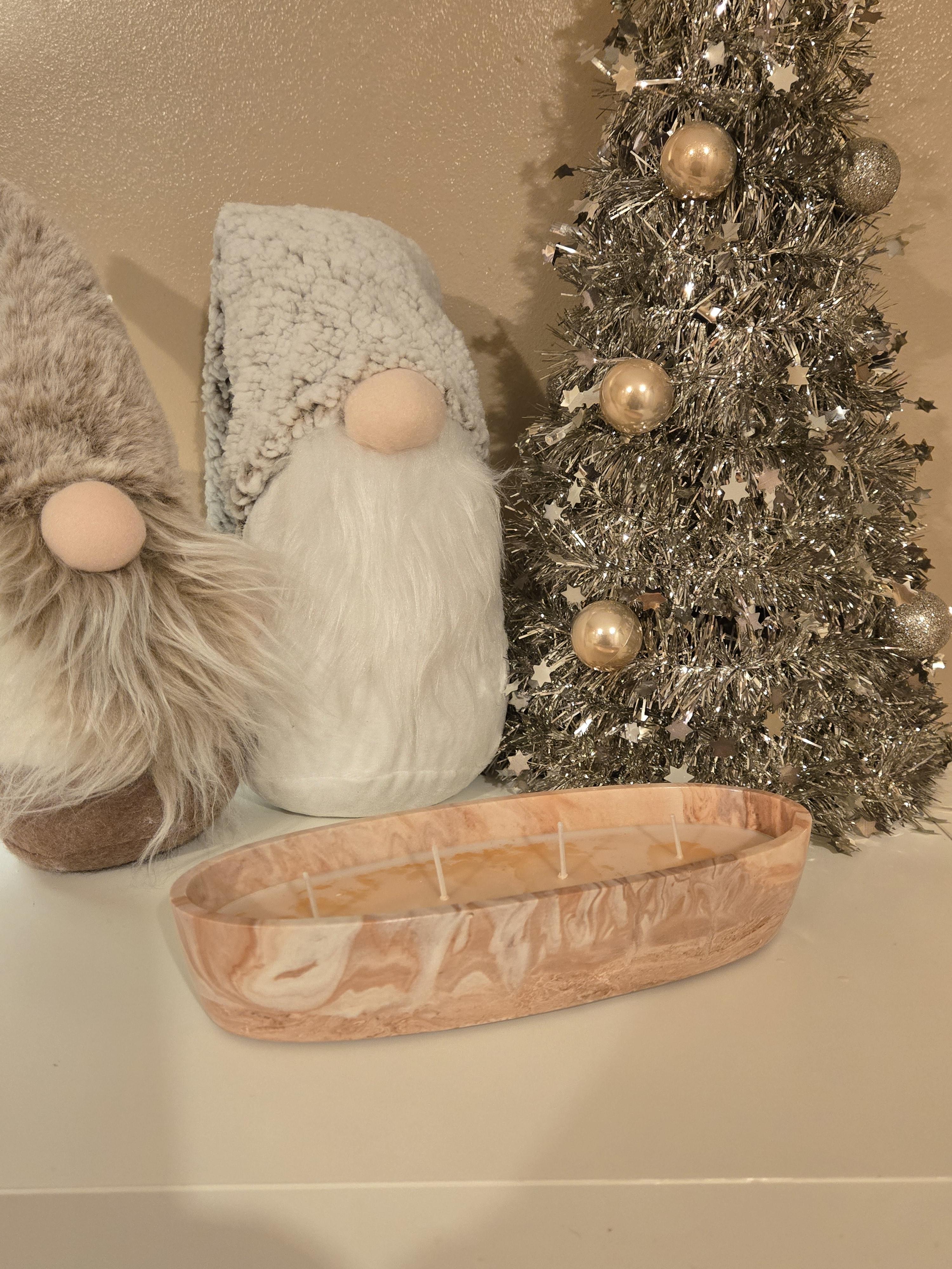 A beautiful Boat shaped handmade pot in a peach & white swirl effect, lovingly filled with our comforting Coffee Cake soy wax, giving off a warm sugary cake notes & a cosy, homely aroma.