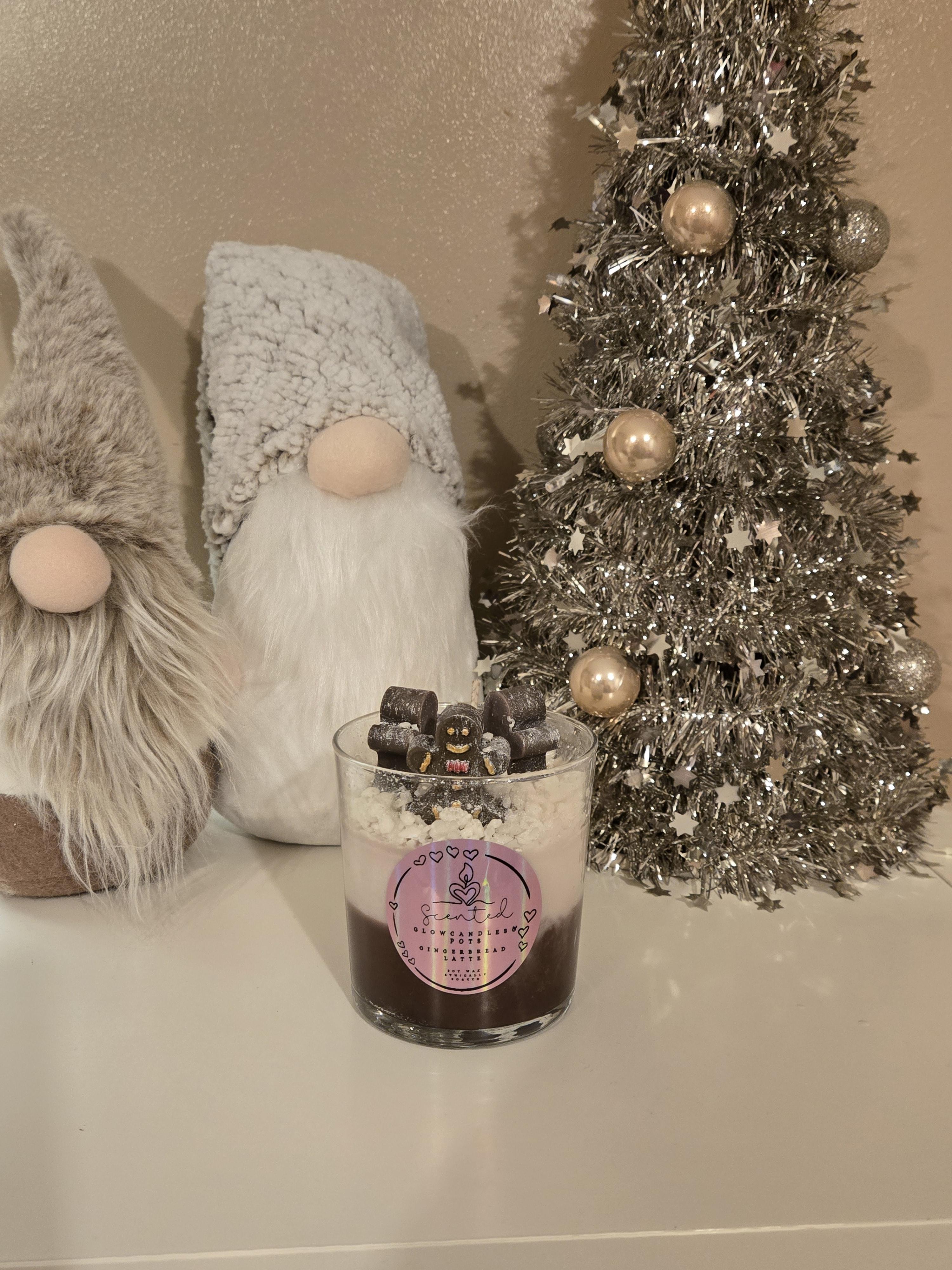 Three Little Gingerbread Men Latte Candle, a cosy festive candle topped with three adorable gingerbread men. Perfect for Christmas vibes.