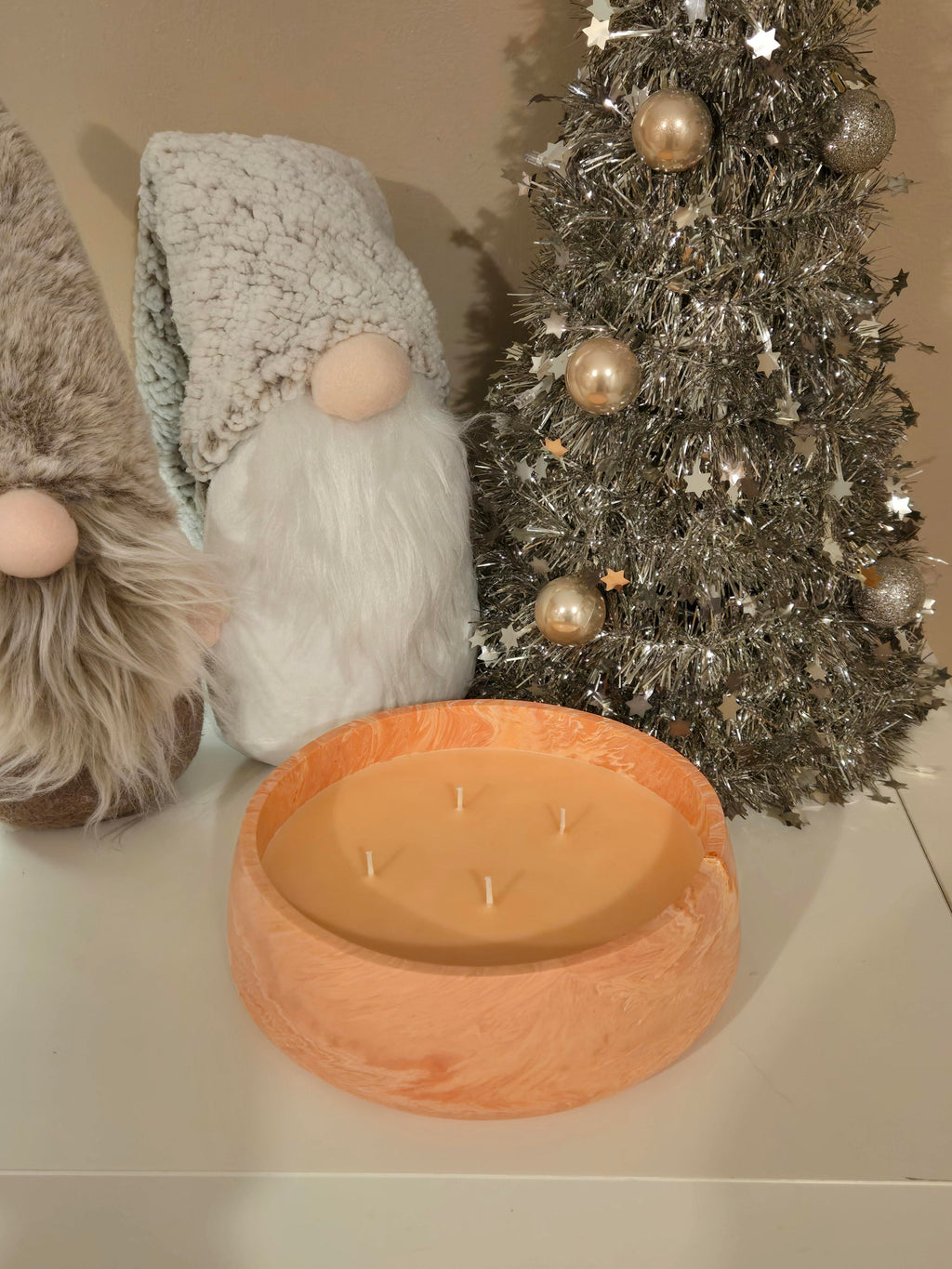 Beautiful Peach Marble style handmade pot, filled with a Mango Fizz Soy Candle
