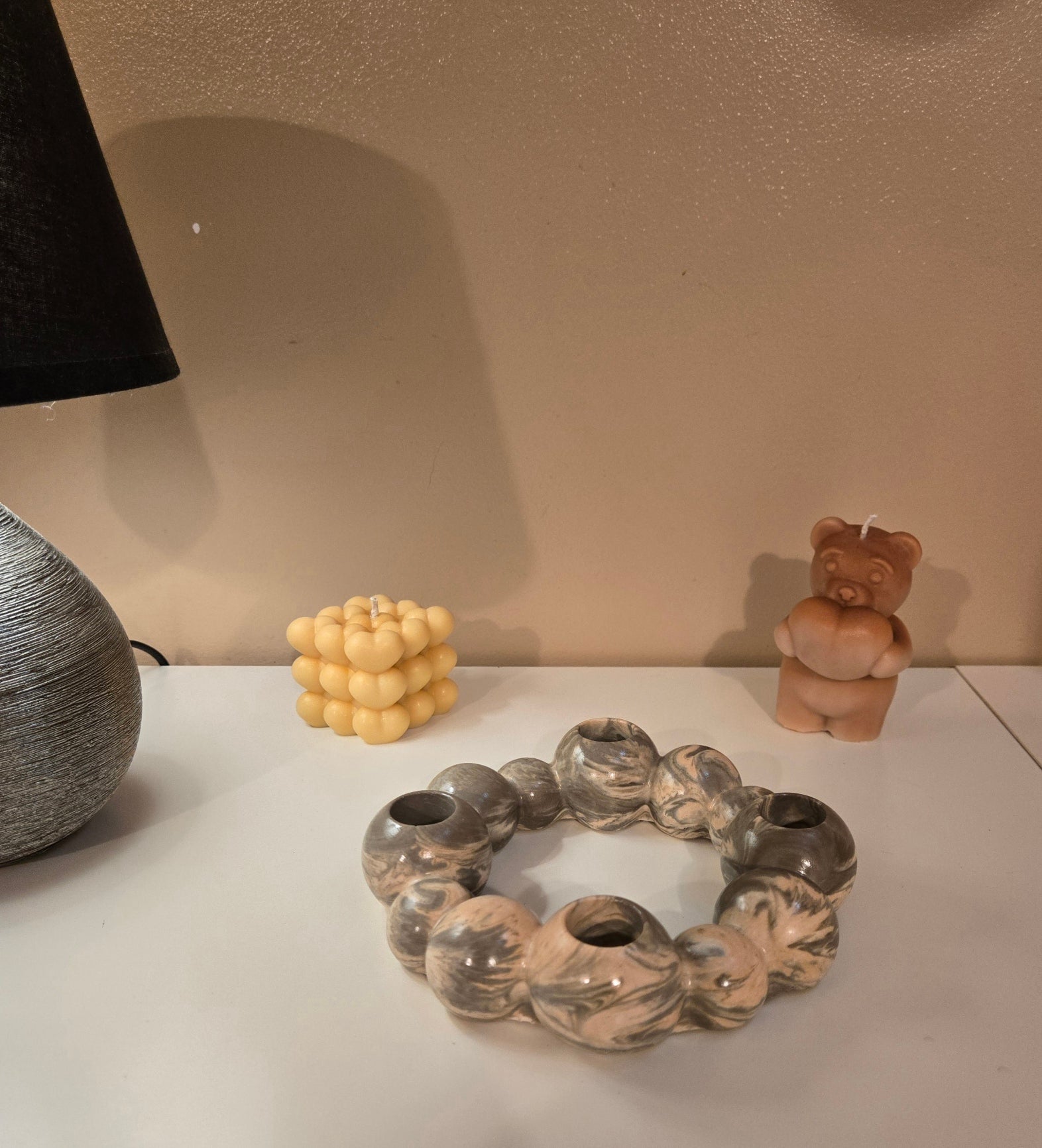 One of our favourite décor pieces.  A handcrafted marbled candle holder designed to bring warmth and style, Elegant • Versatile • Beautiful