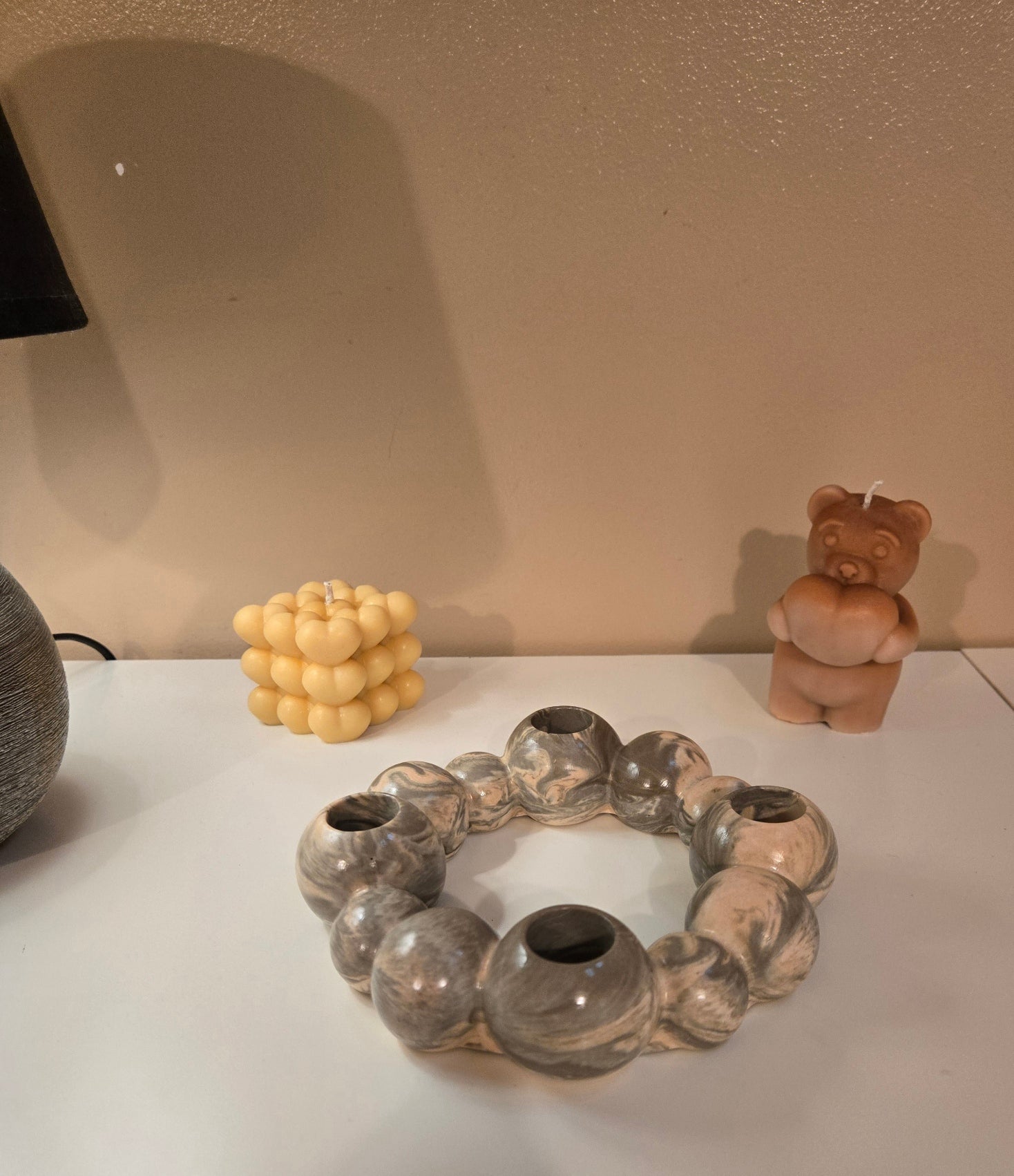 One of our favourite décor pieces.  A handcrafted marbled candle holder designed to bring warmth and style, Elegant • Versatile • Beautiful