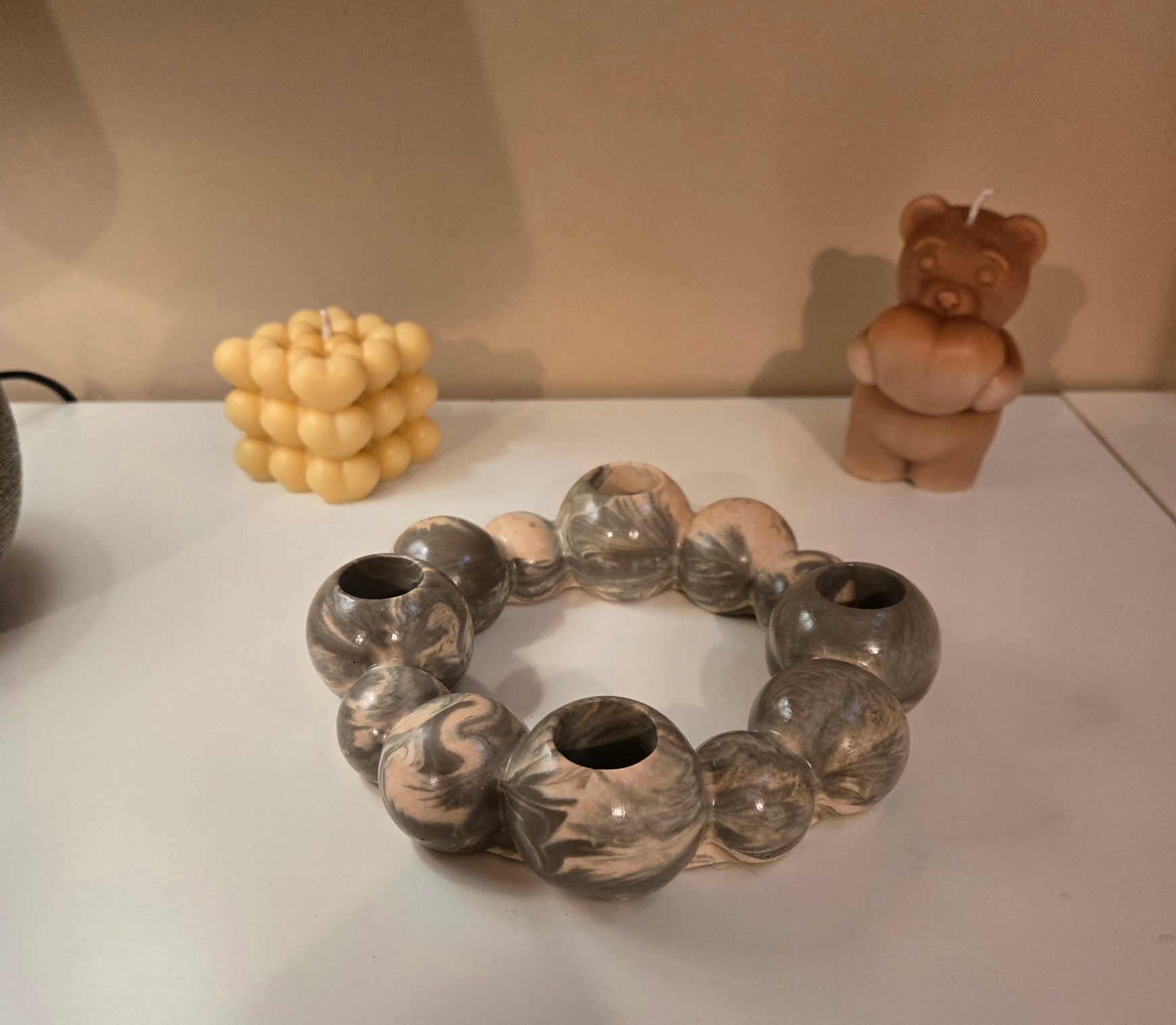 One of our favourite décor pieces.  A handcrafted marbled candle holder designed to bring warmth and style, Elegant • Versatile • Beautiful